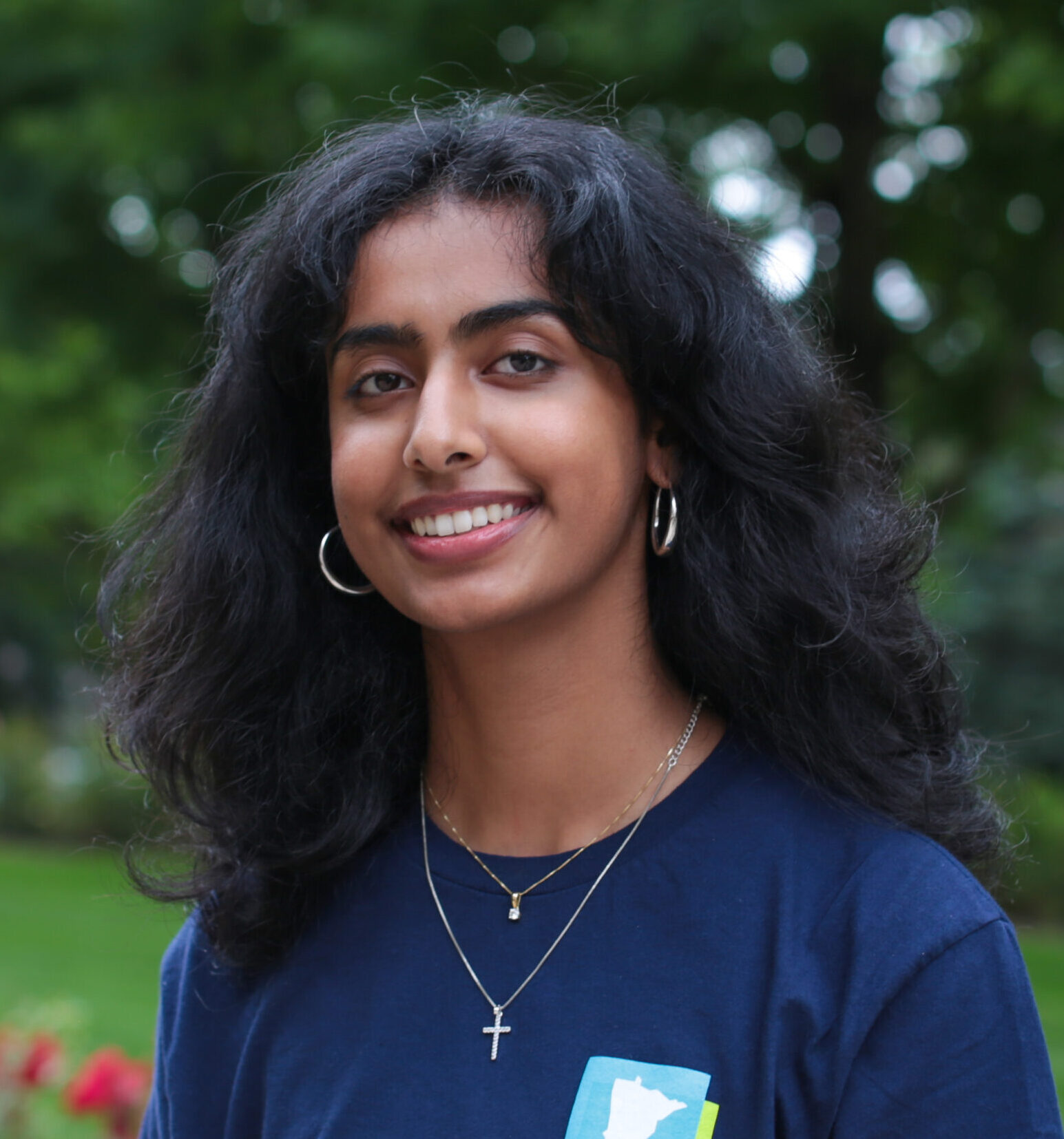 Headshot of Shreya Sekar (she/her)