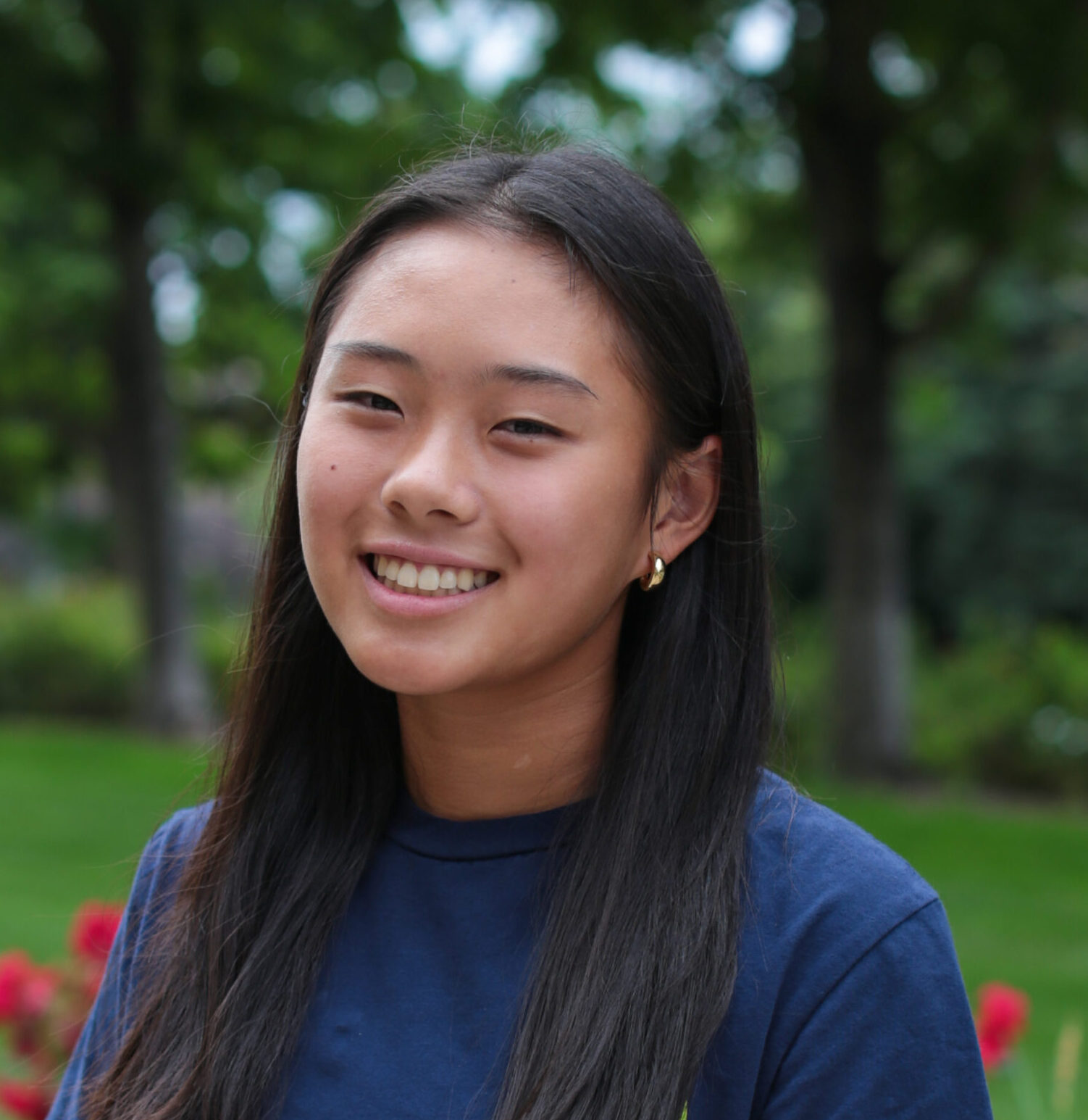 Headshot of Zoe Zhang (she/her)