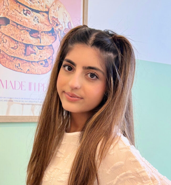Headshot of Zaara Kahn (she/her)
