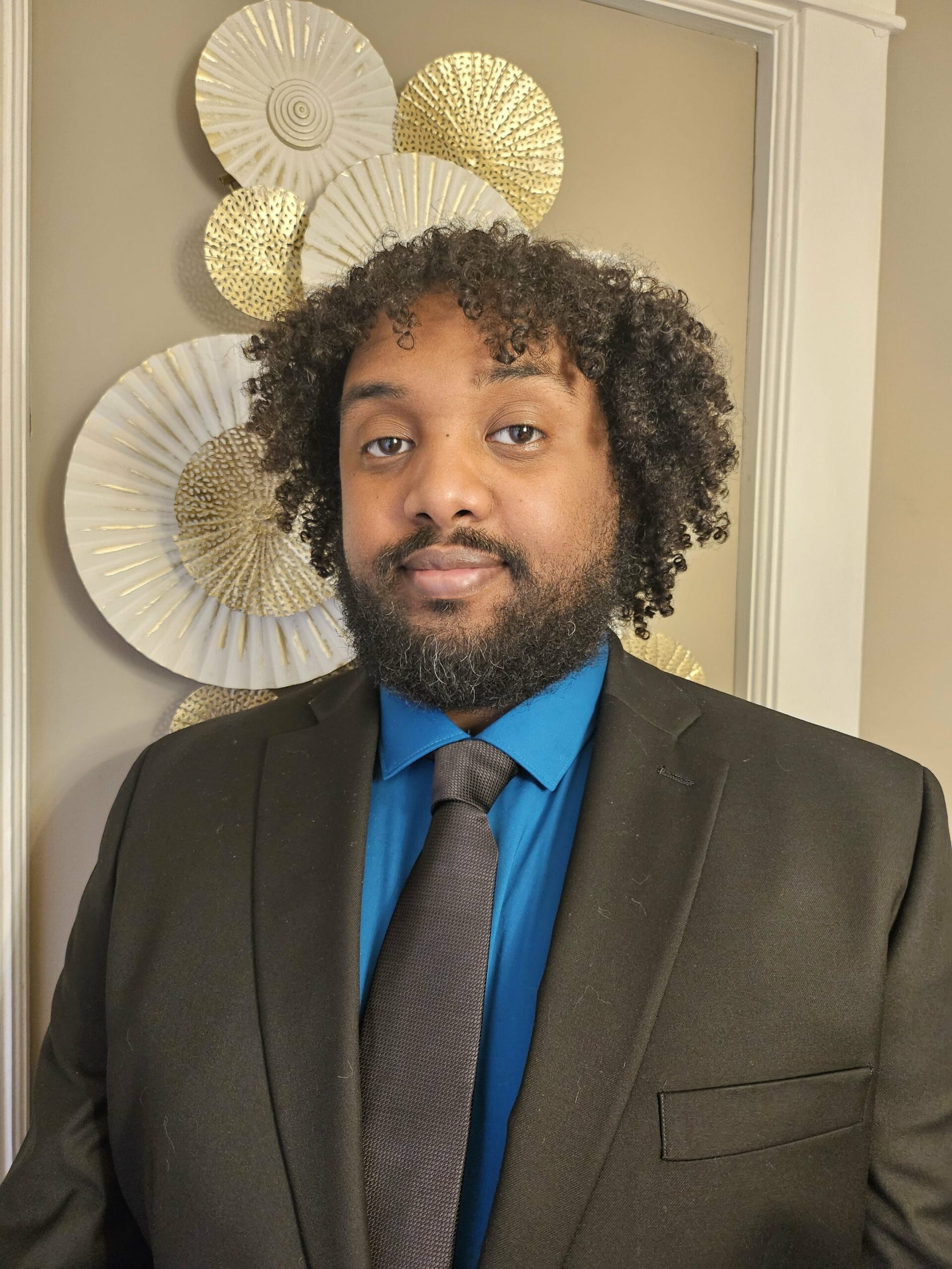 Headshot of Sharmake Hussein