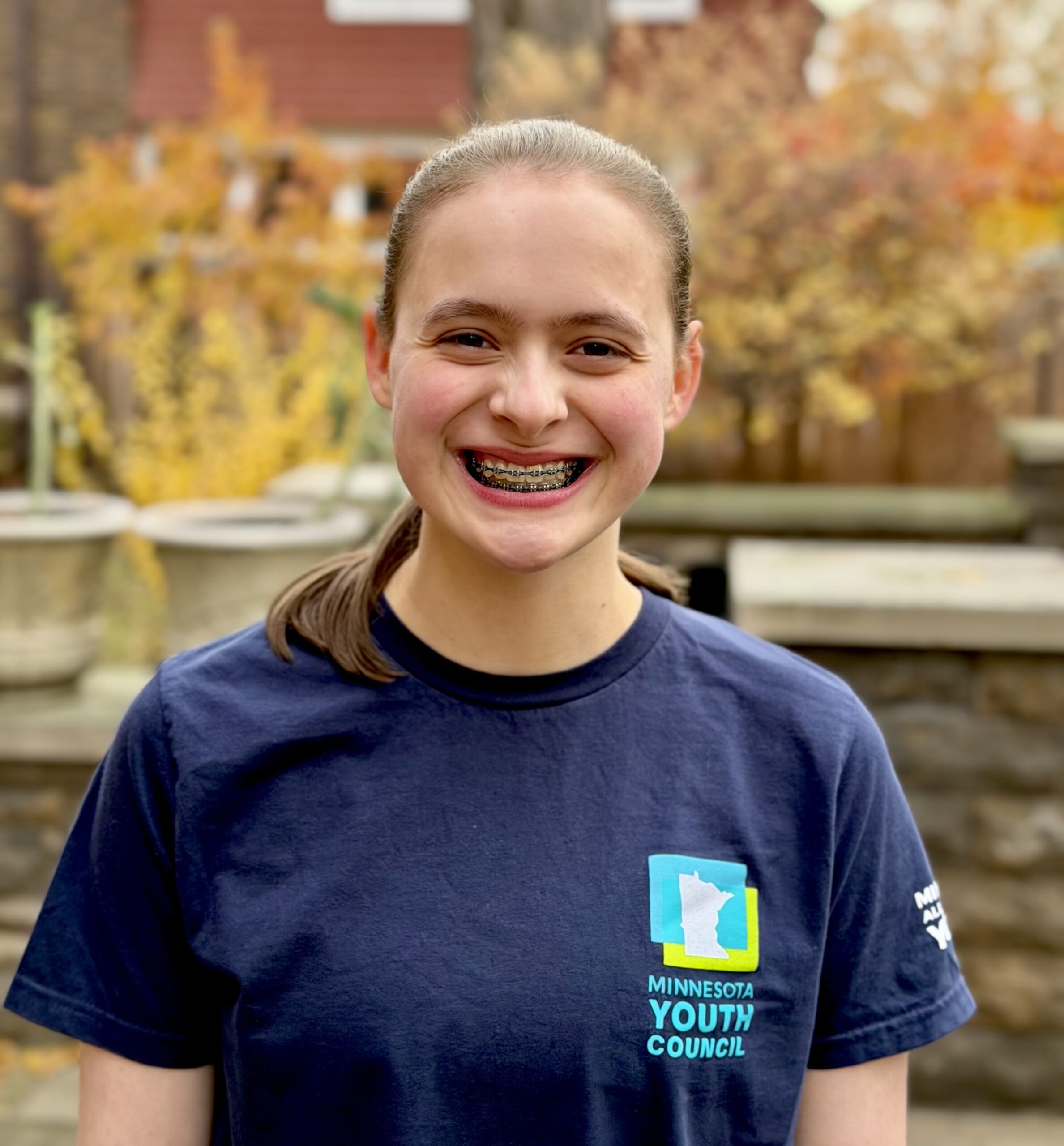 Headshot of Sara Rosenman (she/her)