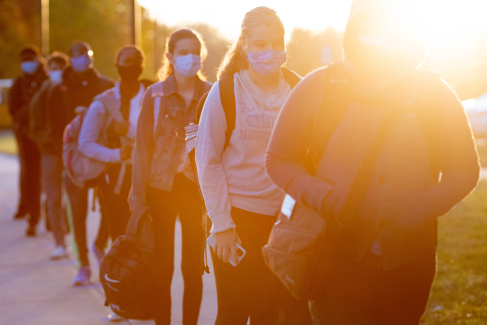 Students in a line with masks on